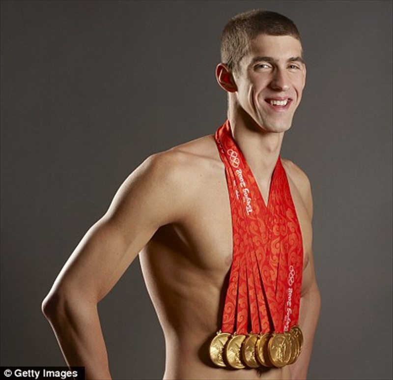 There are 21 Americans with more than one medal.  There are two from the UK, and they're been in more games than we have.